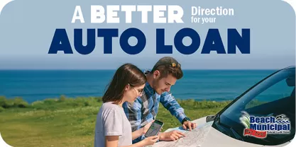 Image of a father and daughter using a car hood to look at maps. The daughter is looking at a map on her phone.